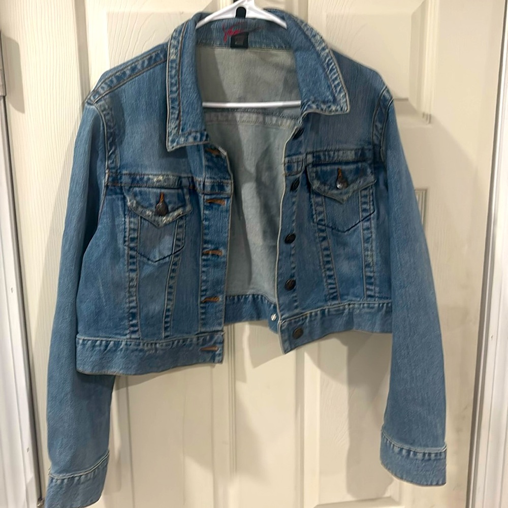 Jean Jacket with distressed pockets, great condition. Size 14/16.